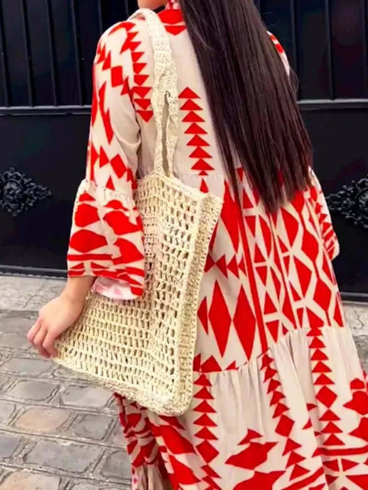 Full-length geometric maxi dress for women with a V-neck, a key piece for summer fashion.
