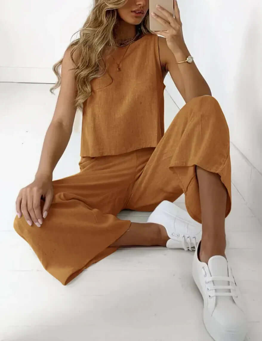 Women's effortless linen two-piece set, perfect for summer comfort. Breathable matching top and bottoms.