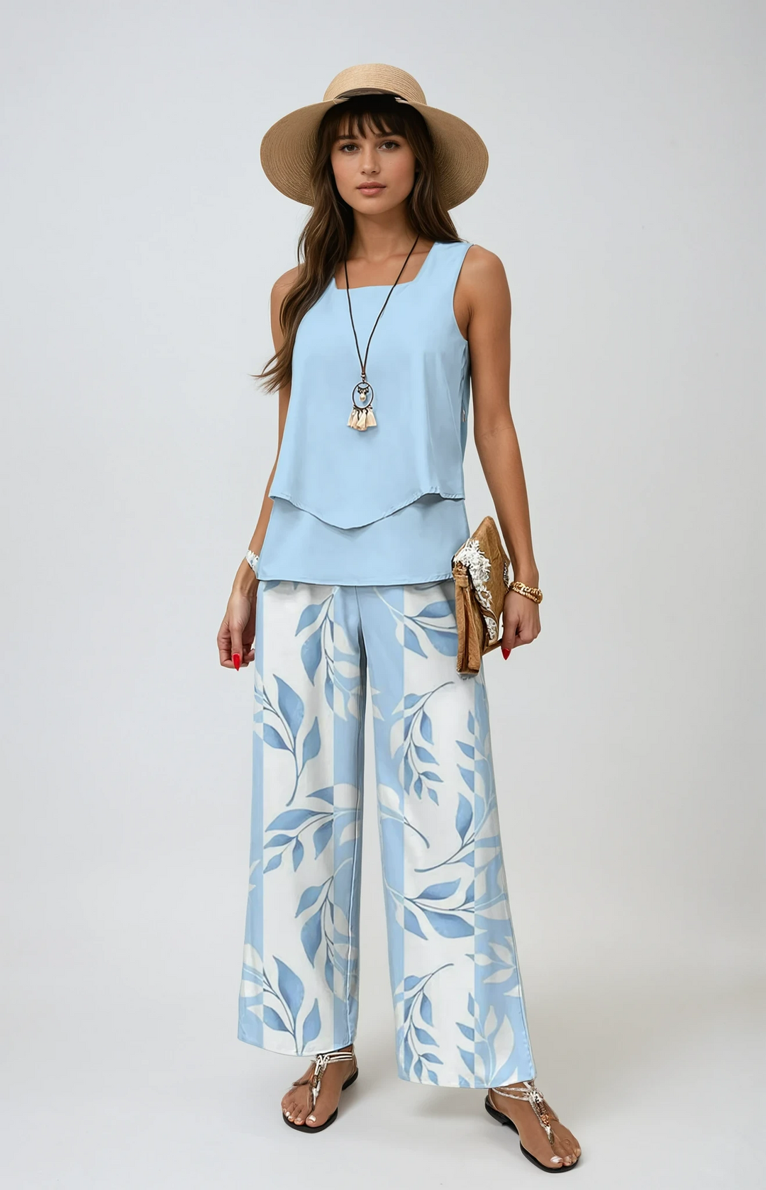 Women's effortless two-piece summer set with wide-leg pants & layered top. Ideal for vacation style.