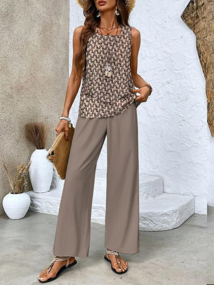 Casual women's two-piece summer outfit, featuring wide-leg pants & a matching comfortable top.