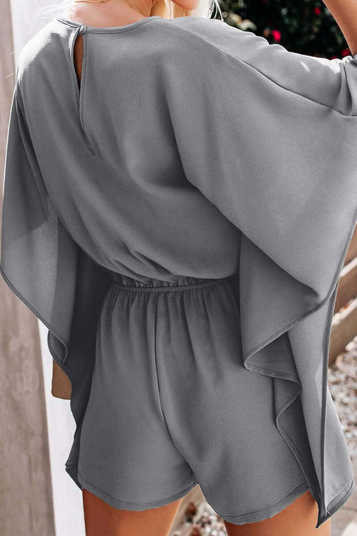 Effortless women's V-neck loose jumpsuit, featuring a comfortable design for casual summer style.