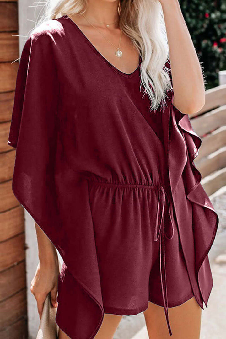 Stylish women's V-neck jumpsuit with a loose, comfortable fit for summer fashion.