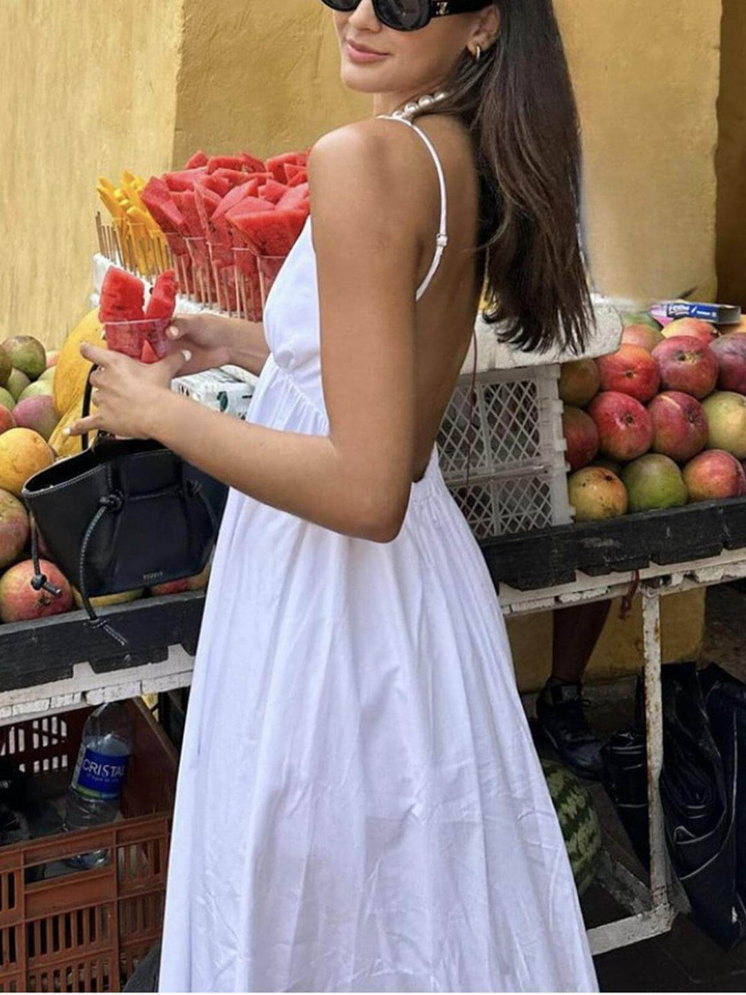 Flowy women's white linen midi dress. Casual yet elegant summer fashion, breathable and comfortable for everyday wear.