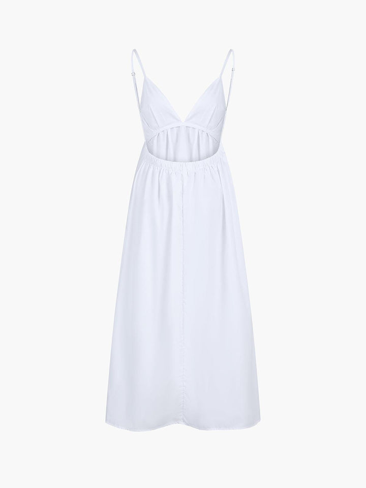 Casual women's summer midi dress in breathable white linen. Effortless style, perfect for comfortable warm-weather wear.