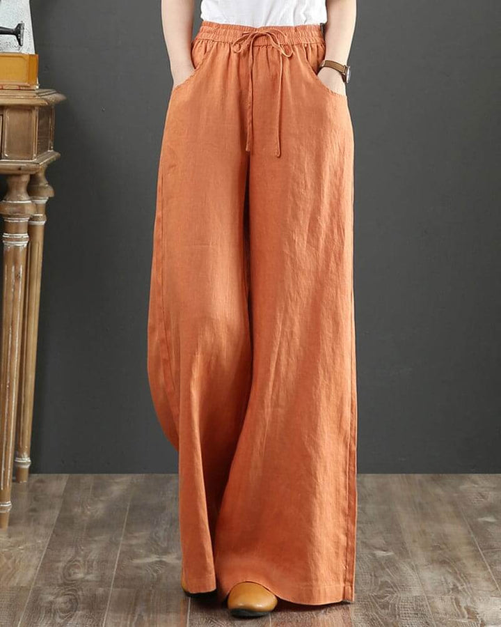 Women's effortless wide leg drawstring trousers. Stylish, comfortable, and loose-fit for everyday wear.