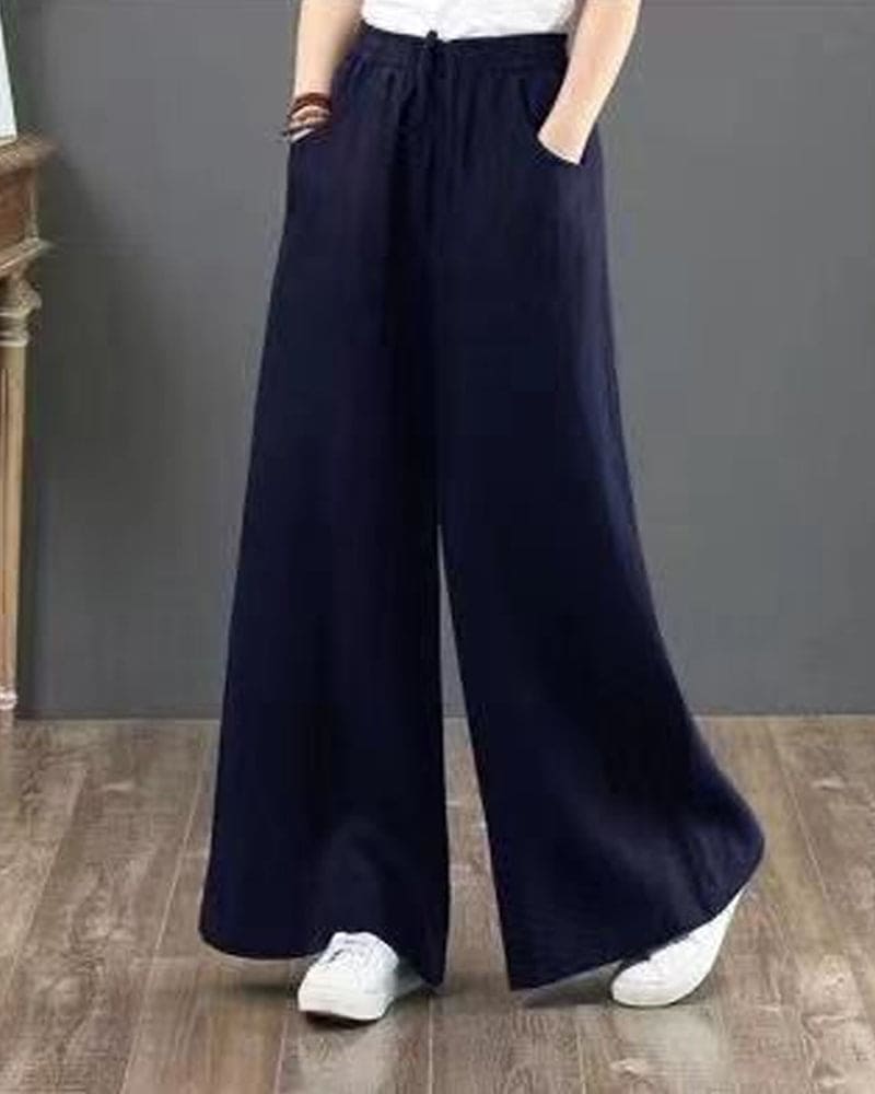 Fashionable women's wide leg trousers with drawstring, perfect for effortless spring & summer comfort.