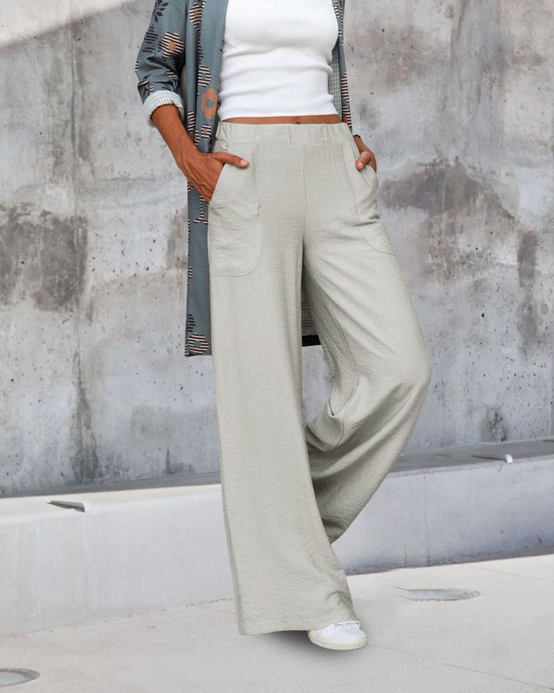 Effortless women's wide leg pants in a neutral shade, combining soft fabric and a comfortable fit for everyday.