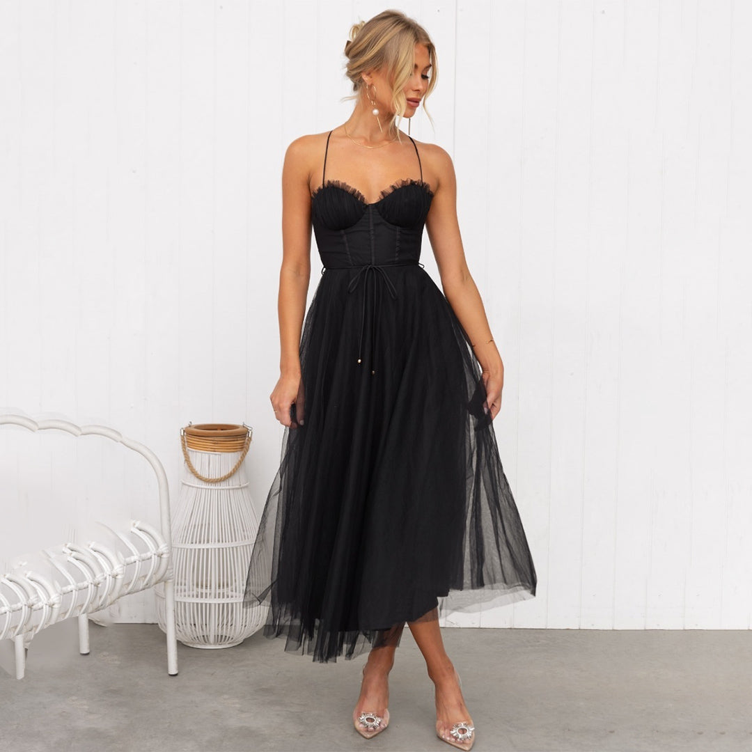 Women's elegant cross-back spaghetti strap corset midi dress, a stunning formal gown for evening wear.