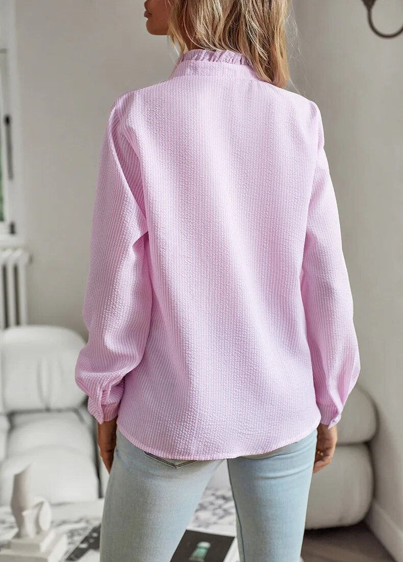 Feel comfortable & chic in this versatile women's elegant blouse. A classic top for everyday fashion.