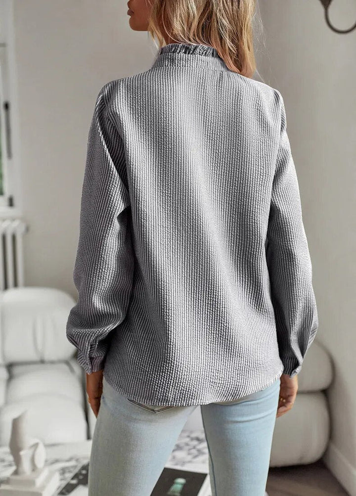 Classic blue women's elegant comfort blouse. Versatile chic fashion for everyday wear.