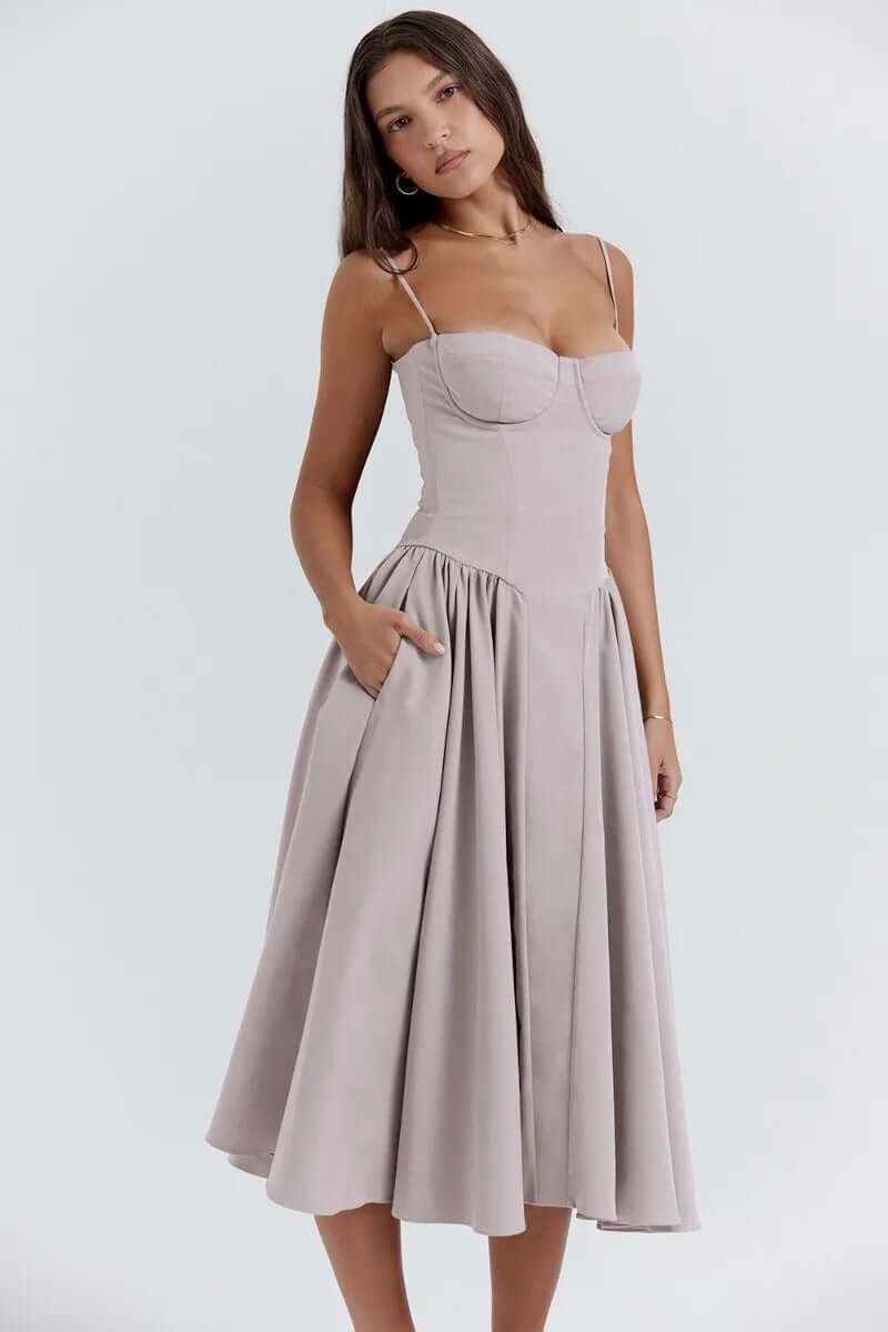 Model wearing a women's elegant sleeveless corset midi dress, perfect for chic fashion.