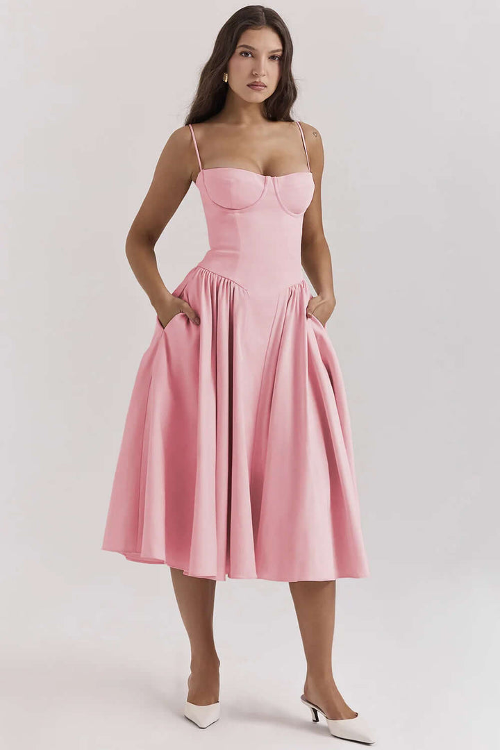 Women's elegant sleeveless midi dress with a flattering corset, embodying effortless chic.