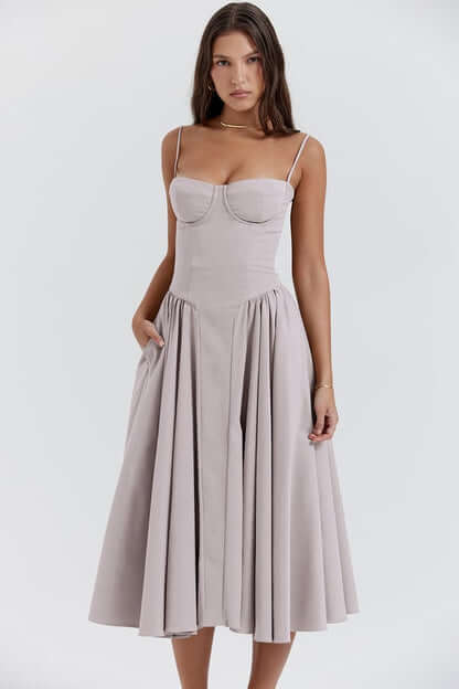 Sophisticated women's midi dress, elegant sleeveless design with a chic corset detail.