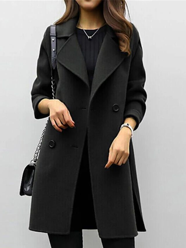 Women's classic long trench coat, double-breasted with sophisticated lapels, essential fall outerwear jacket.