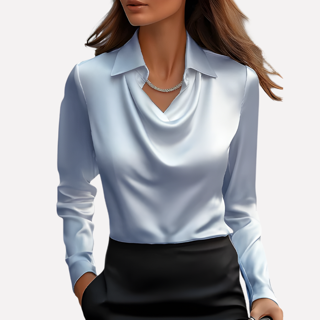 Solid color women's blouse with a beautiful draped collar & long sleeves, providing a chic & polished look.