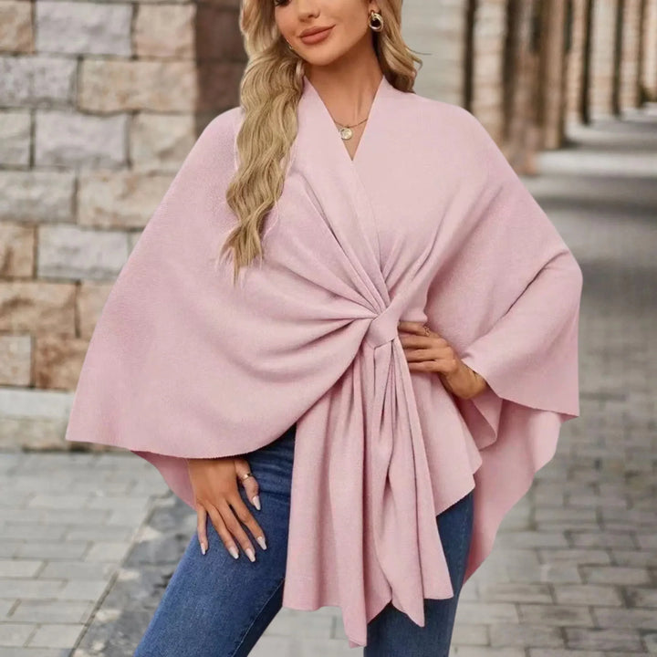 Women's elegant draped poncho, versatile cozy layer for chic fall winter fashion.