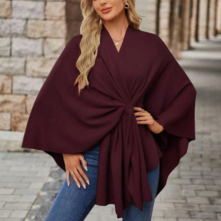 Women's elegant draped poncho, a cozy & versatile fall winter layer. Chic comfort.