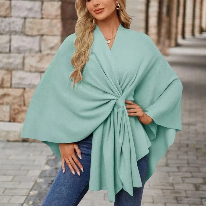 Comfortable women's elegant draped poncho, cozy versatile layer for stylish fall winter days.