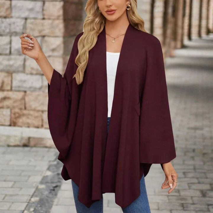 Chic women's draped poncho, elegant and cozy, perfect versatile outerwear for fall winter.