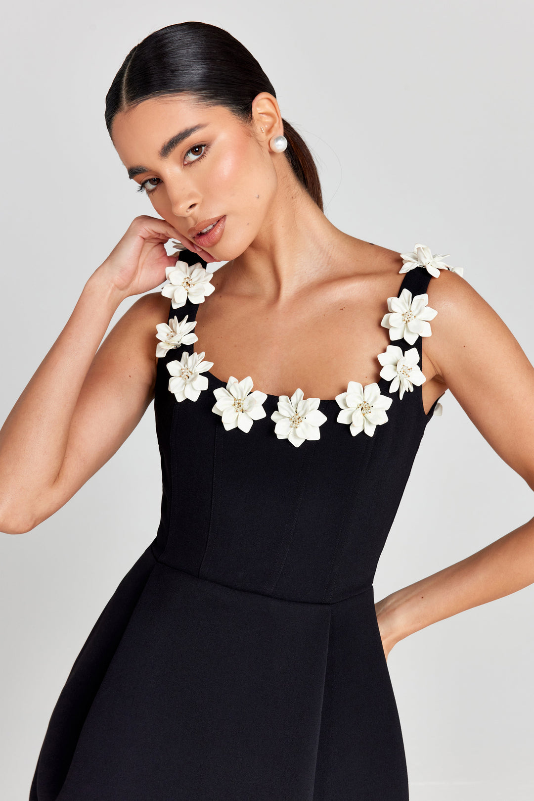 Elegant women's A-line summer mini dress with intricate floral appliqué, ideal for parties.