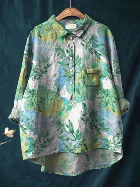 Women's floral blouse with elegant print, a versatile summer top for everyday chic style.