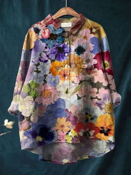 Stylish women's floral blouse with delicate print, perfect for elegant casual summer wear.