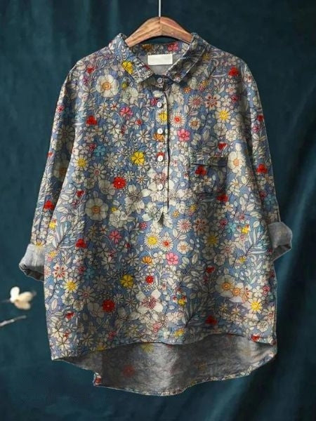 Elegant women's floral printed blouse, a versatile relaxed fit top for everyday style.