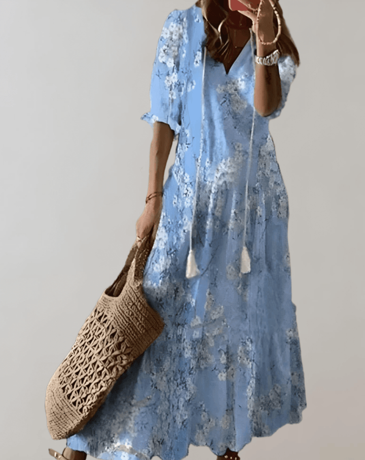 Women's flowy floral maxi dress, bohemian elegance for a comfortable summer vacation look.