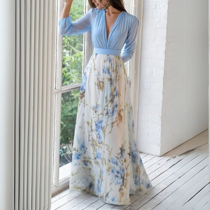 Flowing women's summer party maxi dress with a beautiful floral print, ideal for elegant occasion wear.