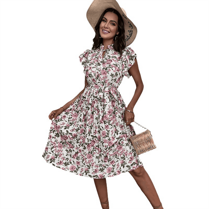 Floral print sleeveless midi dress for women, with a chic belted waist, suitable for summer.