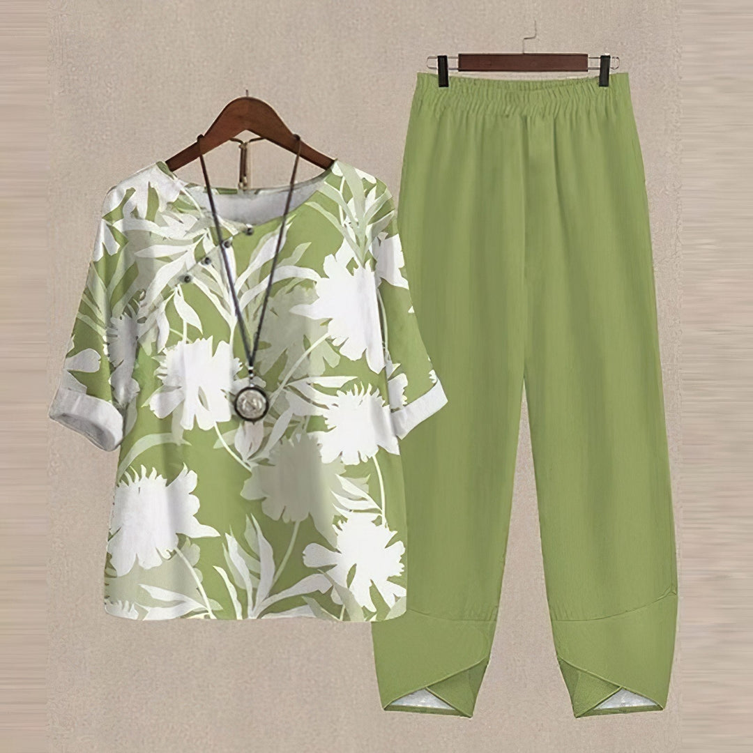 Spring/Summer women's floral two-piece set: O-neck half-sleeve blouse & comfortable elastic waist harem pants.