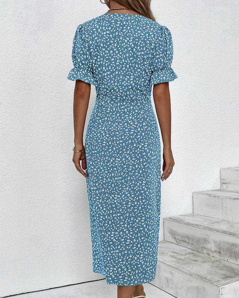 Detailed view of intricate floral pattern and soft texture of this versatile women's v-neck midi dress.