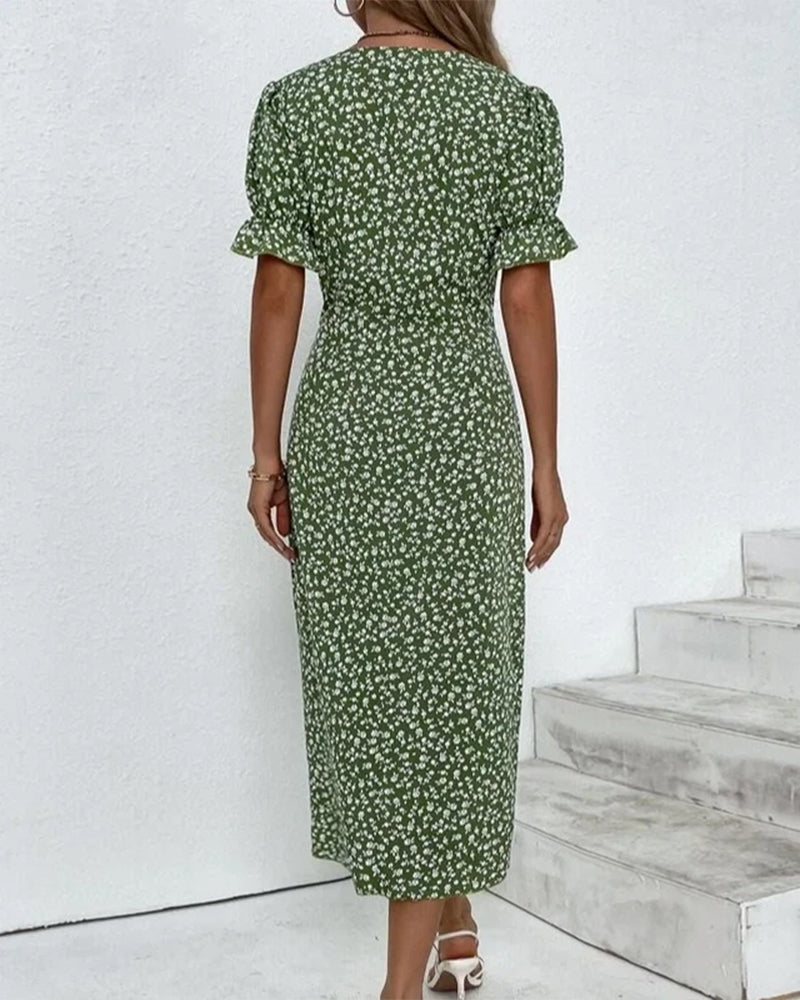 Woman twirling in a flowy, comfortable floral v-neck summer dress, showing its beautiful movement.