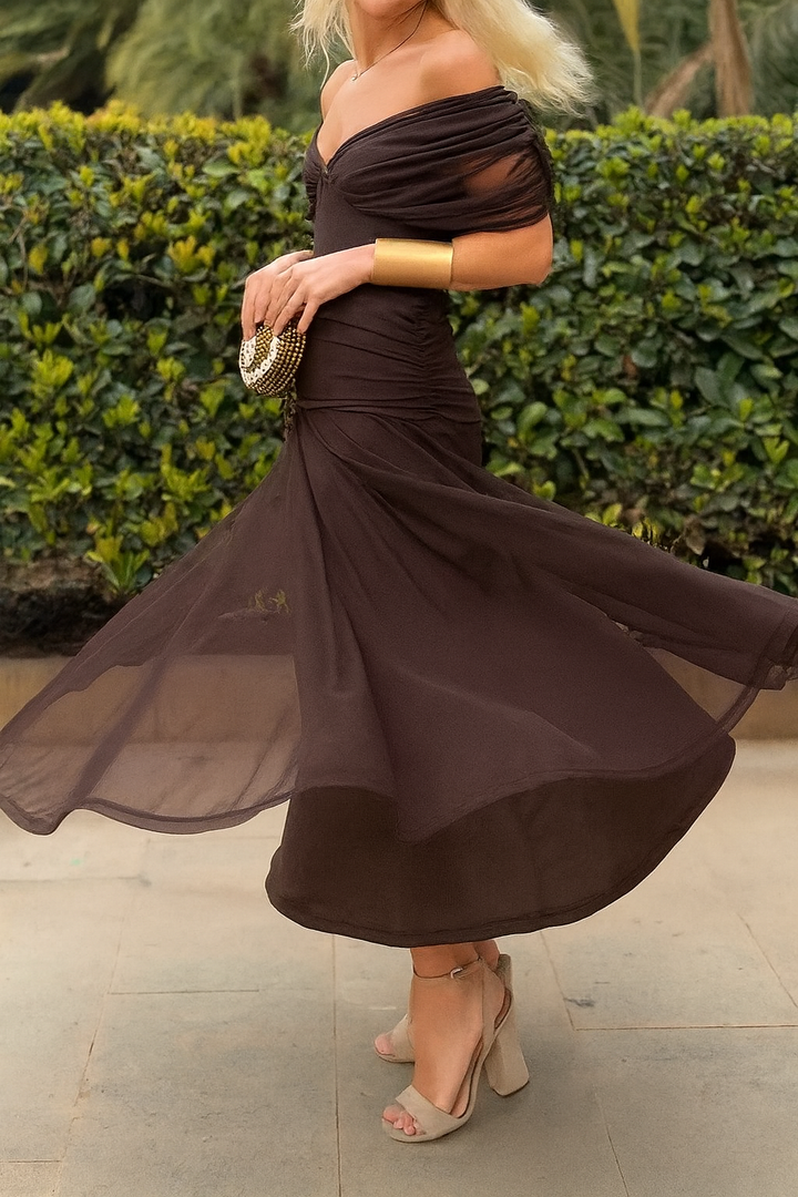 Green flowing midi dress for women, elegant party & special occasion wear. Chic summer fashion, perfect style.