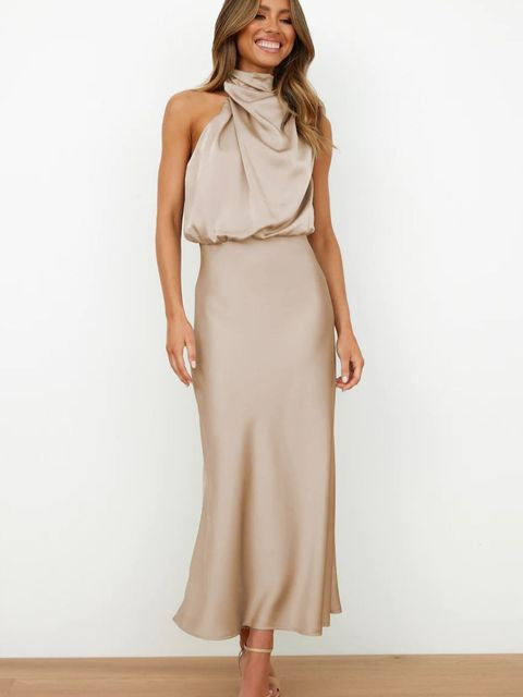 Chic women's formal halter midi dress, a stunning choice for evening wear or as a wedding guest.