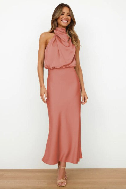 Sophisticated women's midi formal dress, featuring a flattering halter neck for special occasions.
