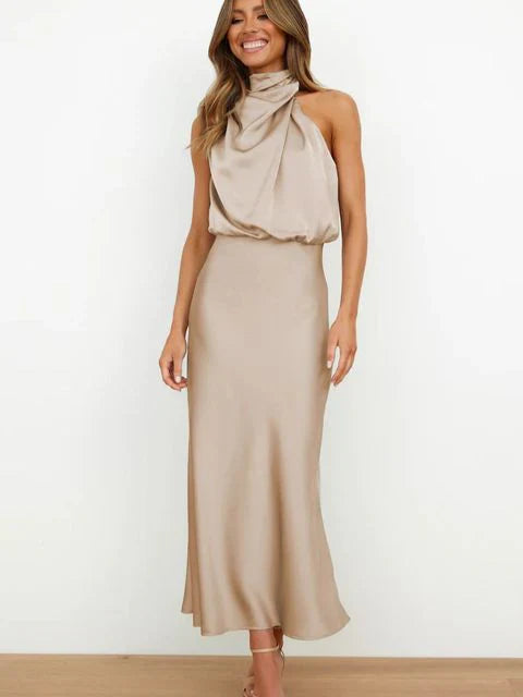 Stylish high neck sleeveless satin gown for women. Ideal summer formal dress or wedding guest attire.