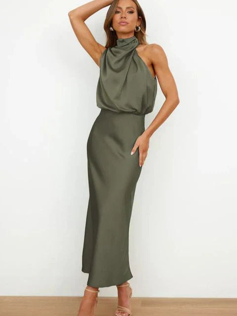 Women's chic high neck sleeveless summer dress in satin. Elegant for evening, party, or special occasions.