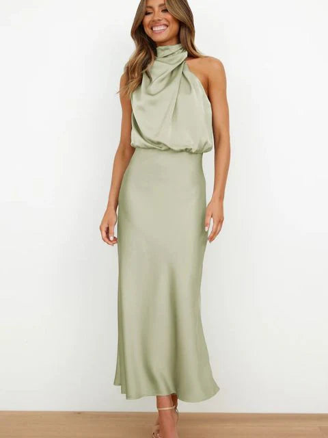 Women's high neck sleeveless satin dress. A stunning summer formal or wedding guest party dress.