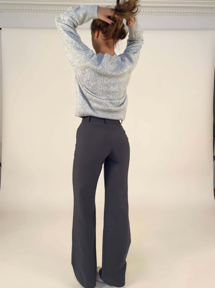 Sleek women's high-waisted straight leg trousers, perfect for a polished and elegant ensemble.