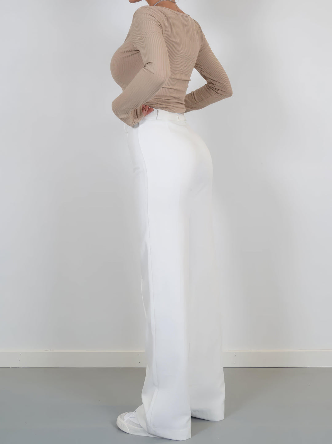 Classic women's high-waisted formal trousers, featuring a flattering straight leg for office fashion.