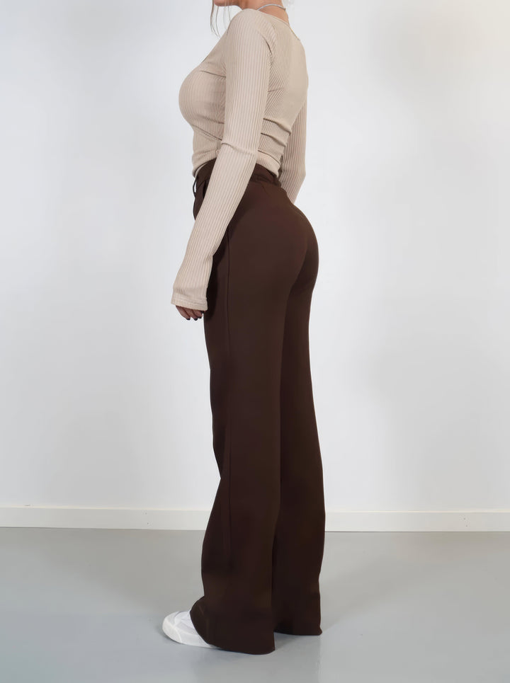 Fashionable women's high-waisted formal pants, a versatile piece for modern office fashion.