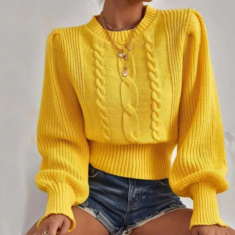 Women's elegant knitted sweater with lantern sleeves, round neck. Perfect cozy pullover for fall fashion.