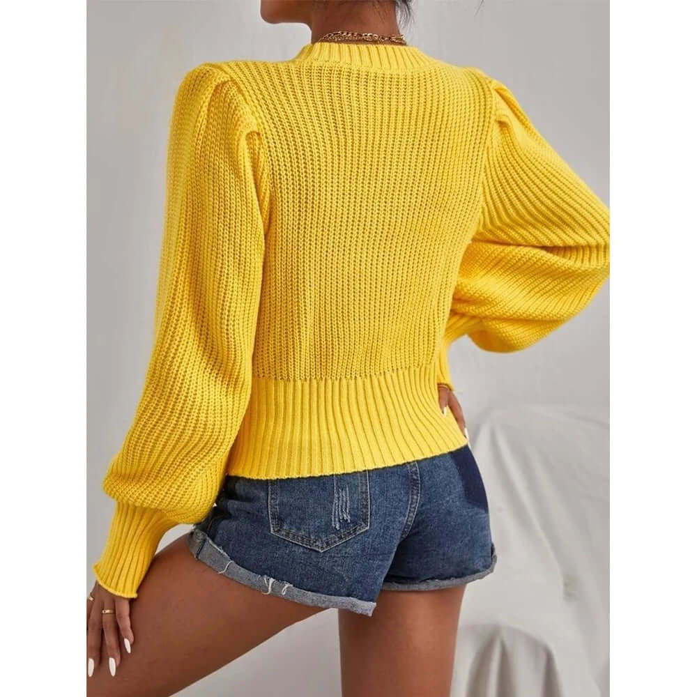 Casual yet elegant women's knitted pullover sweater with stylish lantern sleeves. Perfect for fall comfort.