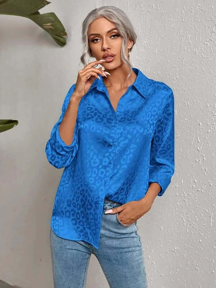 Women's elegant leopard print blouse, perfect day to night jacquard top.