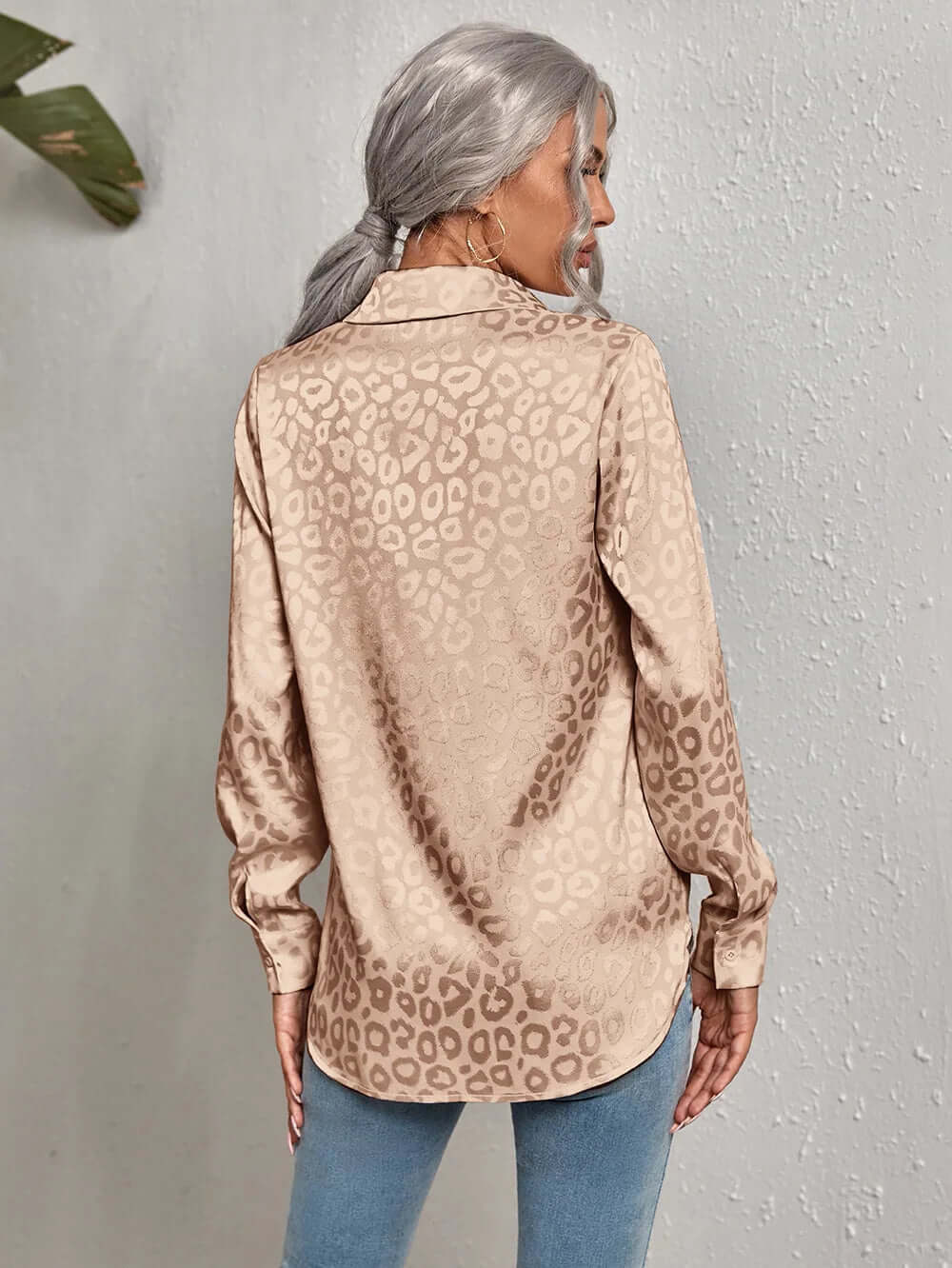 Modern chic women's leopard print jacquard blouse, sophisticated long sleeve top.
