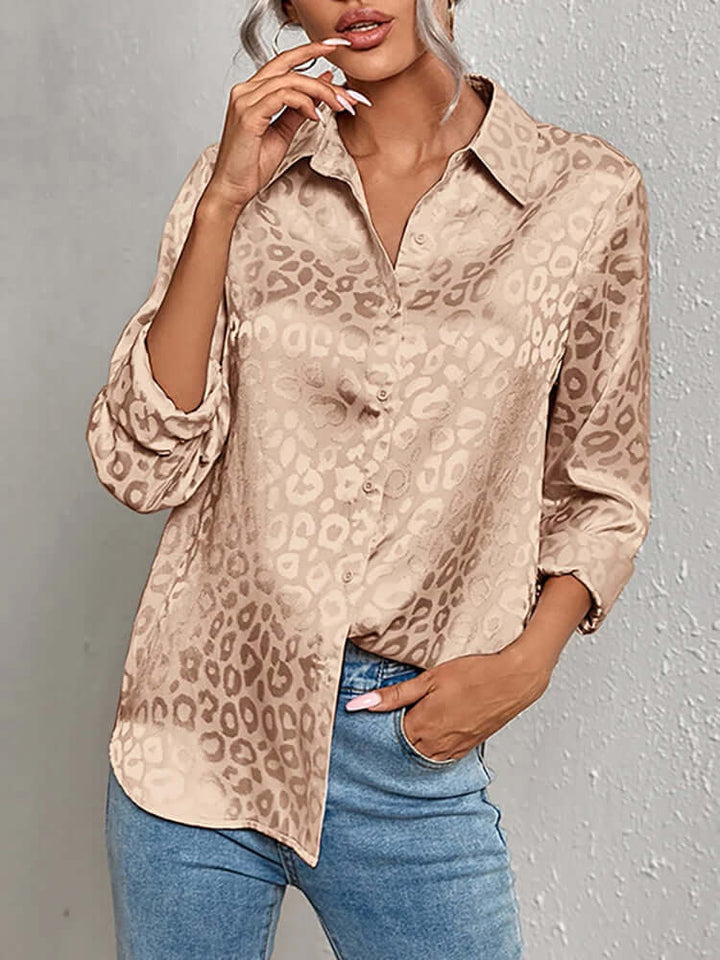 Chic women's leopard jacquard blouse, sophisticated animal print long sleeve top.