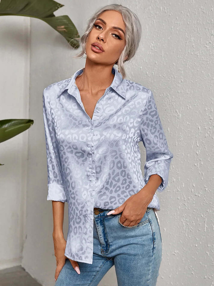 Bold women's leopard print jacquard blouse, an elegant and chic long sleeve top.