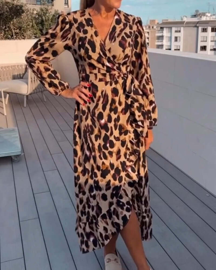 Women's elegant leopard print V-neck midi dress, perfect for casual or fashion-forward looks. Animal print.