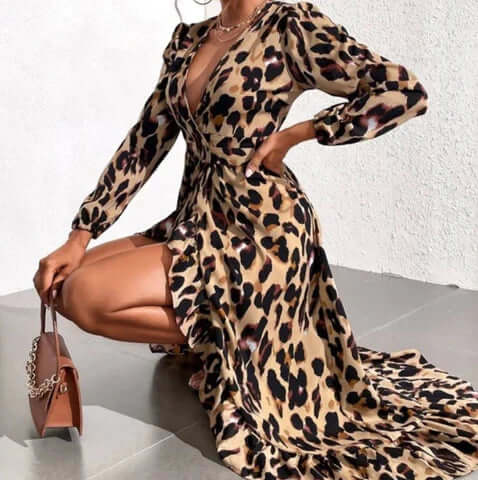 Vibrant leopard print V-neck midi dress for women, a striking animal print fashion statement for any occasion.